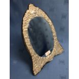 Hallmarked silver oval embossed dressing table mirror, 31cmH