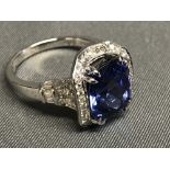 18 carat white gold, diamond and tanzanite ring, size L, 5.9g, approx. total gem weight 4.88 carats,