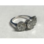 18 carat white gold, impressive three stone diamond ring, 7.1 carats, S.i., colour between G & H