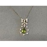 18 carat white gold, diamond and peridot pendant & 18 carat white gold chain, 3.1g