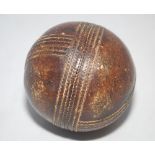 Early cricket ball. Unusual cricket ball with main full seam around the ball and two additional