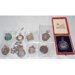 Silver cricket medals. Nine hallmarked cricket medals each with ornate cricketing decoration,