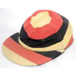 I.Zingari C.C. I.Zingari cricket club cloth cap in club colours of red, black and gold. Sold by