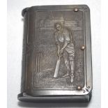 Vesta case. Unusual Victorian bakerlite brown vesta case, modelled as a book, depicting a batsman,