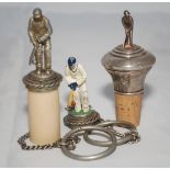 Cricket bottle stoppers. Three various cricket bottle stoppers, two with chain and ring. One silver,