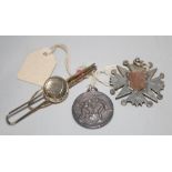 Football. A silver metal football tie pin, a silver and gilt hallmarked football medal 1887 and a