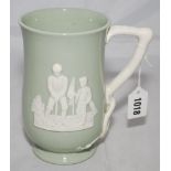 Golfing jug. Attractive Copeland Spode golfing jug in sage green, with golfing scenes in relief in