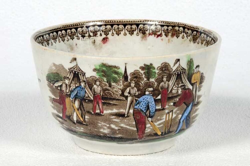 Village cricket bowl. Staffordshire 19th century bowl, transfer printed in sepia with two scenes