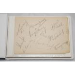 Cricket signatures c1940s/1950s. Small blue photograph album containing a collection of album