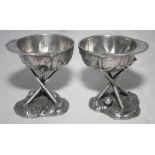Cricket condiment pots. Pair of mustard pots (?) in silver metal in the form of upside down