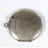 Football vesta case. Rare and attractive silver vesta case in the shape of a football with ring