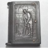 Vesta case. Unusual Victorian bakelite brown vesta case, modelled as a book, depicting a batsman,