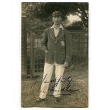 Andrew Sandham. Surrey & England 1911-1937. Mono real photograph postcard of Sandham, full length,