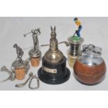 Golf trophy, trinkets etc. Small golfing trophy of a silver rabbit holding a golf club horizontally.