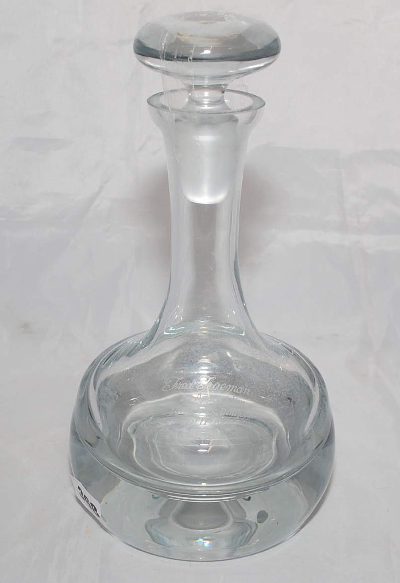 Fred Trueman. A heavy-based glass decanter with stopper. The decanter engraved 'Fred Trueman. In