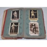 Boxing postcards early 1900s. Red album comprising a good selection of over fifty mono real