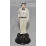 William Clarke. China figure of Clarke in cricket attire. To base 'William Clarke. Founder of