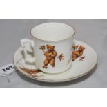 'A Present from New Brighton'. Sporting cup and saucer with transfer printed scenes of bears playing