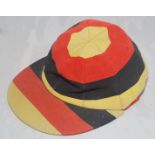 I.Zingari C.C. I.Zingari cricket club cloth cap in club colours of red, black and gold. Sold by