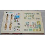 Stamps and first day covers. Large red stamp album comprising a good selection of cricket stamps and