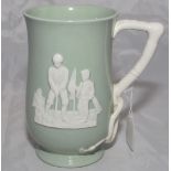 Golfing jug. Attractive Copeland Spode golfing jug in sage green, with golfing scenes in relief in