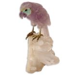 Carved Amethyst Parrot Figurine Mounted on Rock Crystal Base. Mainly amethyst carved body with