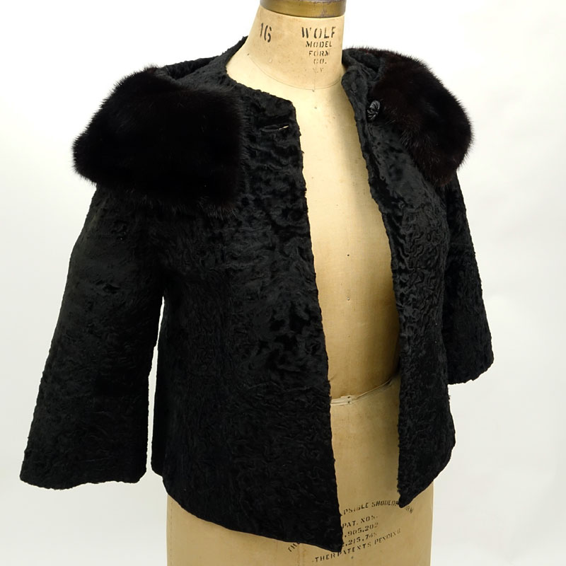 Vintage Marshall Field Company Black Persian Lamb Coat. Mink shawl collar, three-quarter sleeve.