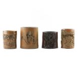 Lot of Four (4) Chinese Carved Bamboo Brush Pots. Various themes. Largest measures 6-5/8" x 5-3/4" x