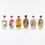 Grouping of Six (6) Vintage Chinese Reverse Painted Snuff Bottles. Two bottles depict erotic scenes,