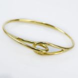 Tiffany & Co 18 Karat Yellow Gold Bangle Bracelet. Stamped. Slightly out of round otherwise good