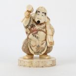 Japanese Carved Bone Polychrome Daikoku Figurine. Signed on base. Normal wear to surface otherwise