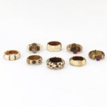 Grouping of Eight (8) Indian Carved Bone Bangle Bracelets. All mounted with brass, seven with pin