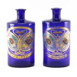 Pair of Cobalt Glass Gilt Painted "Pharmacie Continentale" Apothecary Bottles. Open pontil base.