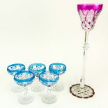 Six (6) Pieces St Louis Crystal Stemware. Featuring an extra tall wine hock and 5 small champagne