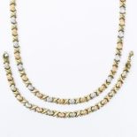 14 Karat Tri-color Gold Heart Necklace and Bracelet Suite. Stamped 14K. Very good condition.