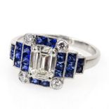 Art Deco style Approx. 1.0 Carat Emerald Cut Diamond, 1.27 Carat French Cut Sapphire and Platinum