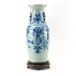 Large 19/20th Century Chinese Blue and White Porcelain Vase on Wooden Stand. Mock foo dog handles.