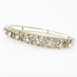 Vintage 14 Karat Yellow Gold and Seed Pearl Bangle Bracelet with Small Diamond Accents. Stamped 14K.