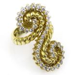 Retro 18 Karat Yellow Gold and Round Cut Diamond Spiral Ring. Signed ?. Good condition. Ring size 5.