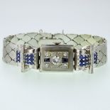 Lady's Circa 1940's Retro Approx. .75 Carat Diamond, 1.00 Carat Sapphire and 14 Karat White Gold