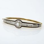 Vintage Diamond, Pearl, Enamel and 14 Karat Yellow Gold Bangle Bracelet. Stamped 14K. Surface wear