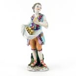 19th Century Dresden Hand Painted Porcelain Figurine Holding Fruits. Stamped with crown over "D"