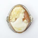 Antique Carved Shell Cameo and White Metal Pendant/Brooch. Unsigned. Good condition. Shipping $28.00