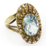 Victorian Oval Cut Aquamarine, Rose Cut Diamond and 14 Karat Yellow Gold Ring. Aquamarine measures