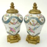 Pair 19th Century French Sevres Bronze Mounted Enamel Gilt Hand Painted Miniature Urns. Flower motif