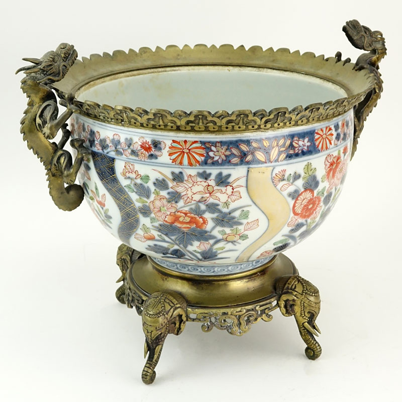 Large Japanese Imari Bronze Mounted Jardinière. Dragon and elephant bronze motif. Bronze mounting is