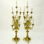 Pair of 20th Century Italian Bronze 9 Arm Electrified Candelabra. Decorated with rococo style leaf