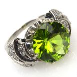 Vintage Approx. 5.0 Carat Round Brilliant Cut Peridot, .60 Carat Diamond and Palladium Ring.