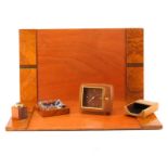 Six (6) Pieces Gucci Desk Accessories. Includes: Ashtray, lighter, leather cased clock, note paper