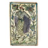 Antique Persian Glazed Faience Pottery Plaque. Depicts a young man posing in nature scene. Natural